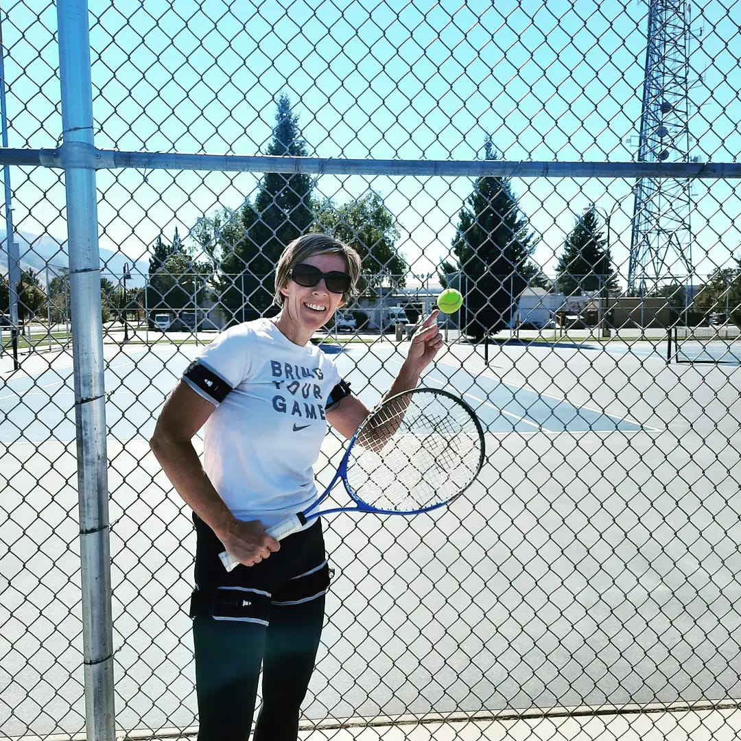 B3 BFR Bands Woman wears B3 BFR Bands for tennis training